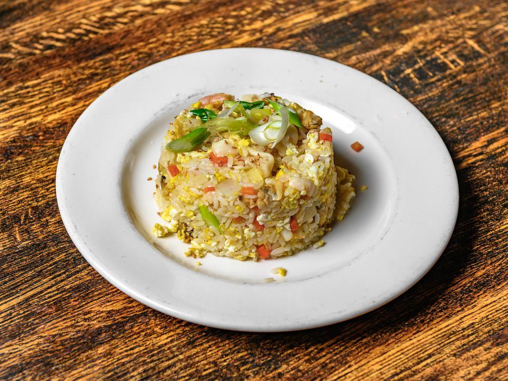Seafood Fried Rice · Pan-fried rice, egg, assorted vegetables, and seafood