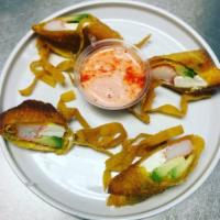 Crab Egg Roll · 4 pieces.