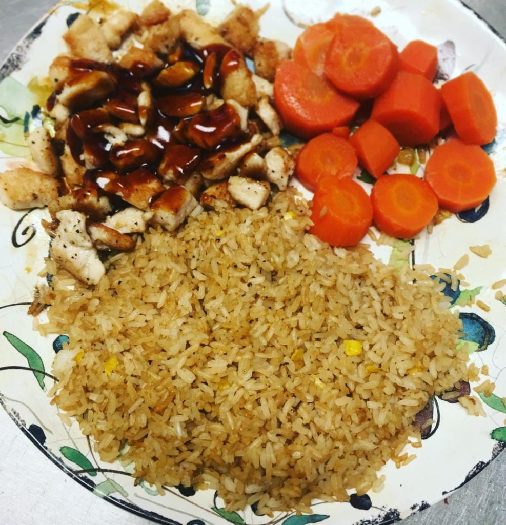 Hibachi Chicken Dinner · Includes fried rice, sweet carrots and salad.