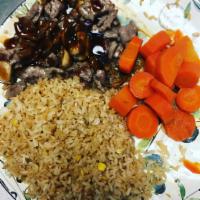 Hibachi Steak Dinner · Includes fried rice, mushrooms, sweet carrots and salad.