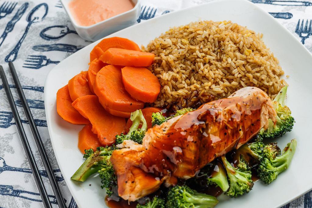 Hibachi Salmon Dinner · Includes fried rice, broccoli, sweet carrots and salad.