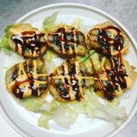 O.E.C. Roll · 6 pieces. Grilled tuna inside the roll fried, eel sauces and spicy mayo on top.