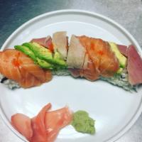 Rainbow Roll · 8 pieces. Tuna, salmon, white fish and avocado on top of California roll.