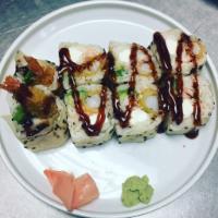 Titanic Roll · 8 pieces. Shrimp tempura, crab meat, cream cheese and avocado in soy wrap. Top with eel sauce.