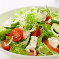 Garden Green Salad · Fresh sliced tomatoes, bell peppers and romaine lettuce served in vinegar, olive oil and bla...