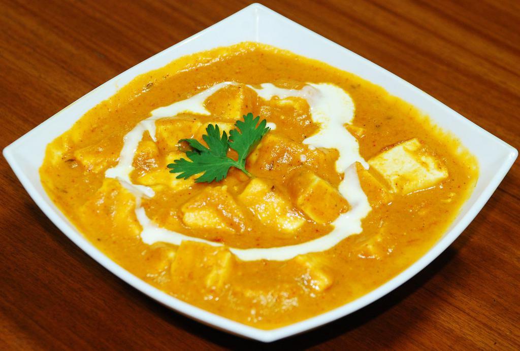 Shahi Korma · Paneer cooked in a yogurt curry sauce with spices.