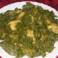 Saag Paneer/Chole (Vegan) · Cottage cheese with creamy spinach sauce.