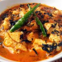 Methi Curry · Cubes of paneer in fenugreek leaves and onion sauce.
