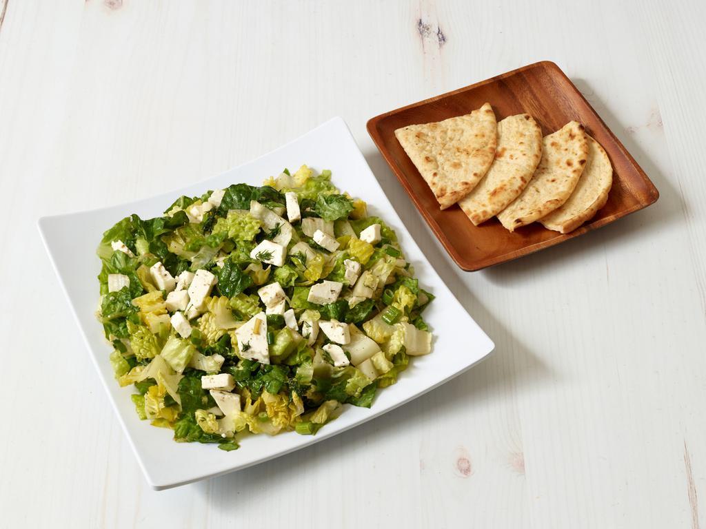 Marouli Salad · Baby romaine with scallions, dill and feta in olive oil with lemon vinaigrette.