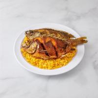 26. Mojarra Frita · Fried fish, rice and salad.