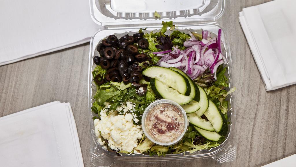 Greek Salad · Included mixed salad, olives, red onions, cucumbers and feta cheese.