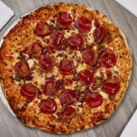 Miras Meatza Pizza · Included: tomato basil marinara, mozzarella, bacon, pepperoni, beef, sausage and ham.