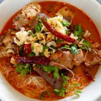 Kanom Jeen Num Ngio (Rice Vermicelli & Spare Ribs Curry (Northern Style)) · Rice vermicelli, ground pork, ribs, and tomato chili broth. Served w/ pickled cabbage, beans...
