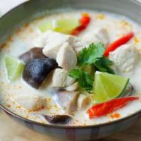 Tom Kha  · (Coconut Soup) Coconut milk in lemongrass broth, mushroom, tomato, white onion, scallion and...
