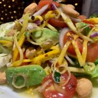 Mango Salad with AVOCADO · Mango,Avocado, lemongrass, red onion, lime leaf, scallion, cilantro, chili, tomato, cashew n...