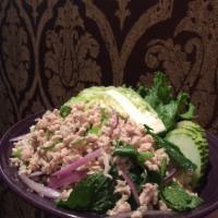 Larb Gai (Isan Chicken) · Mint, Thai chilies, red onion, roasted rice powder, fish sauce, and lime juice
