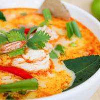 Tom Yum Goong (Shrimp) · Shrimp soup. Spicy lemongrass broth, mushroom, tomato, celery and milk.