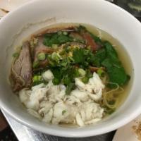 Bamee Pu Moo Dang (Egg Noodles w/ Roasted Pork and Crab Meat) · Egg noodles, roasted pork and crab meat, bok choy, scallion, cilantro in clear meat broth w/...