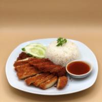Kow Mun Gai Tod (Fried Chicken Over Rice) · Fried marinated chicken over ginger rice w/ sweet chili sauce