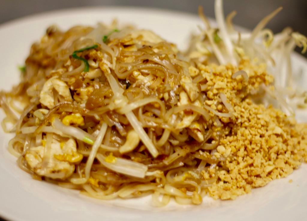 Pad Thai · Thin rice noodles stir fried w/ bean sprouts, chives, egg, tamarind, preserved radish, and ground peanuts