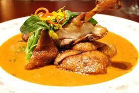 Duck Panang  · Crispy duck with Panang curry and steamed vegetables
