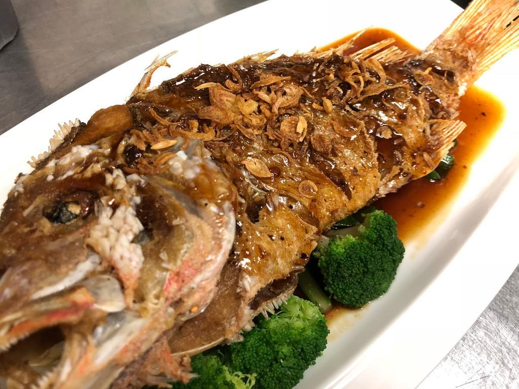 Pla Makham · Crispy whole red snapper with special tamarind sauce, topped with fried red onion, served w/rice