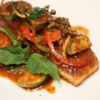 Salmon Pad Ped · Pan fried salmon with Thai eggplant, pickled peppercorns, bell pepper,
basil, wild ginger w/...