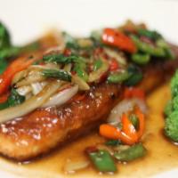 Salmon Ga Prow · Pan fried salmon sautéed with Thai spicy basil sauce w/ bell pepper and onion. Served w/ rice.