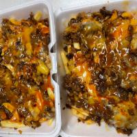 S-Meal Plate · Loaded fries with meat and cheeses.