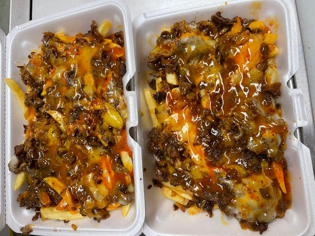 S-Meal Plate · Loaded fries with meat and cheeses.