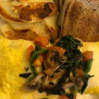 Garden Omelette · Spinach, diced tomatoes, mushrooms, and Swiss cheese.