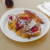 French Toast Delight · French toast topped with pecans, your choice of fruit compote, and your choice of 2 sausage ...