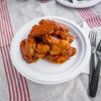 Buffalo Wings · Choice from hot, mild, BBQ or honey BBQ.