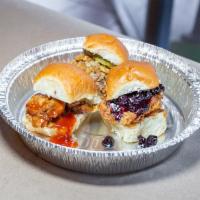 Lil Buffalo Sliders · 3 smoked pulled chicken sliders tossed in buffalo sauce with ranch and pickles served on Haw...