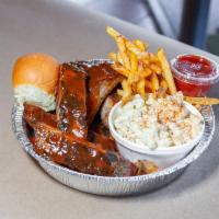 Full-Rack of Ribs · Smoked St. Louis style ribs with our housemade BBQ sauce with your choice of 2 sides