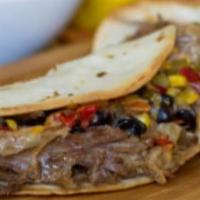 QUESADILLA DE Canitas ( Roasted Pork Quesadilla) · 3 cheese, pico de gallo, corn, sour cream & salsa