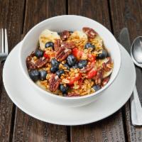 Wellness Oatmeal Bowl · Home style oatmeal topped with sliced banana, blueberries, nuts and granola. 

IMPRESSIVE HE...