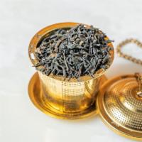 Earl Grey Supreme · Naturally Black Breakfast Tea.  