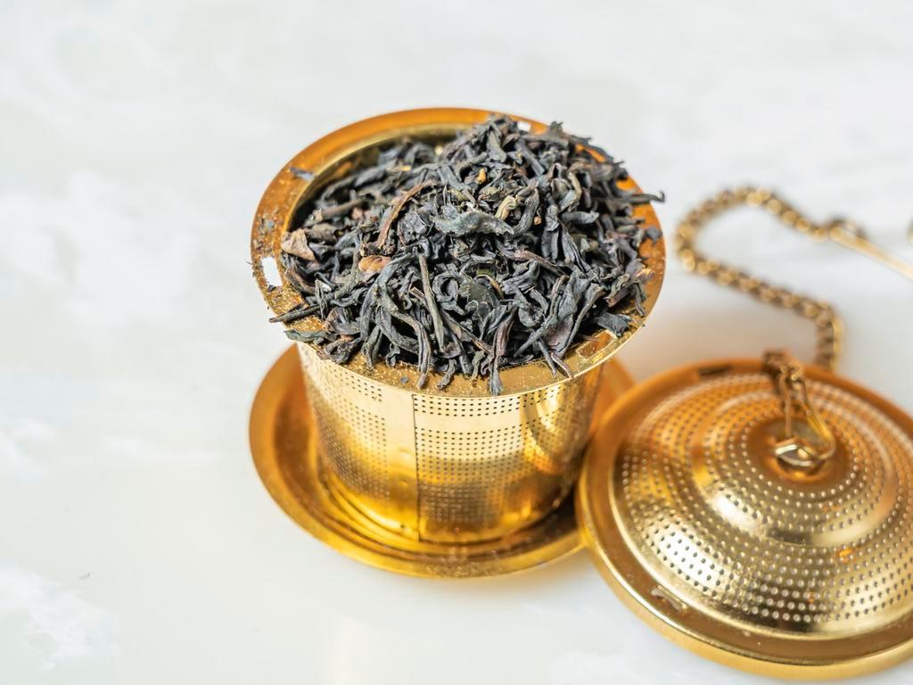 Earl Grey Supreme · Naturally Black Breakfast Tea.  