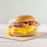 Egg, Meat and Cheese Sammie · Butter and egg on a bagel of your choice.