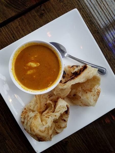 Roti Canai · 2 pieces of roti with curry chicken dipping sauce. Extra roti for an additional charge.
