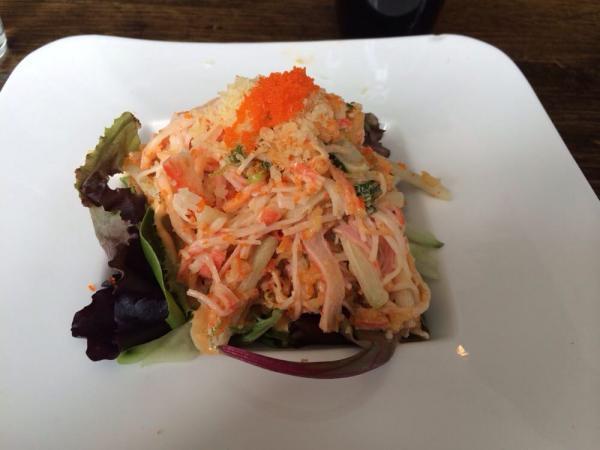 Spicy Kani Salad · Crabmeat, cucumber, caviar, and tempura flake with spicy mayo.