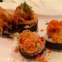 Lobster Volcano Roll · Torched lobster and shiitake mushroom topped with spicy crab meat, scallion and masago.