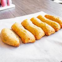 Breadsticks · Toasted and roasted with garlic butter and Parmesan cheese.
