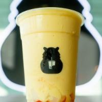 Tropical Delight Smoothie · Flavors of green apple, strawberry, mango, and peach infused to create a tropical smoothie