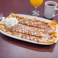 Bananas Crepes with Nutella · Two Delicious French Crepes with Nutella hazelnut spread , bananas and fresh whipped cream