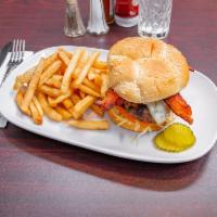 Mushroom-Swiss Bacon Burger · 1/3 lb. ground patty, mushrooms, Swiss cheese & bacon on a toasted sesame bun with lettuce, ...