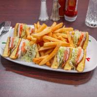 Clubhouse · Served with 3 slices of toasted egg bread, layered with mayonnaise, turkey, bacon, lettuce &...