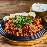 Jeyook Bokum (Serve 1-2) · Pan fired spicy pork, kimchi, onion, scallion, red pepper and scallion and steamed tofu on t...