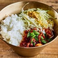 Spicy Chicken Rice Bowl · Steamed rice served with pan fried Spicy Chicken and vegetable (red pepper, scallion, onion,...
